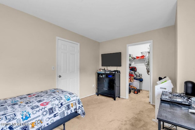 1202 Alpine Trl, Neptune Township, NJ 07753 - bedroom featuring a walk in closet, light colored carpet, a closet, and baseboards