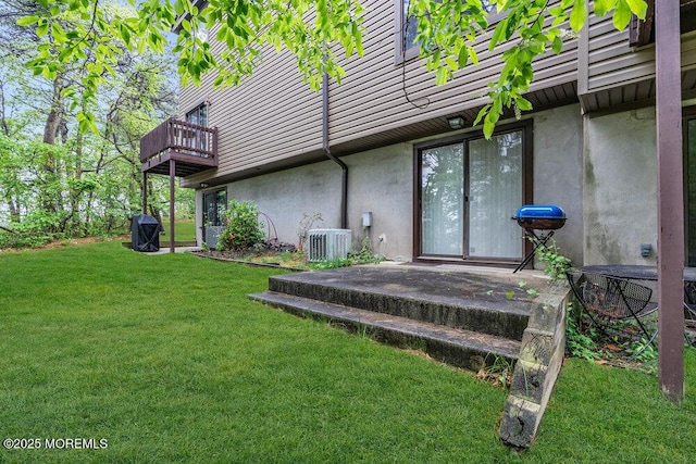 1202 Alpine Trl, Neptune Township, NJ 07753 - back of house featuring stucco siding, a yard, and a balcony