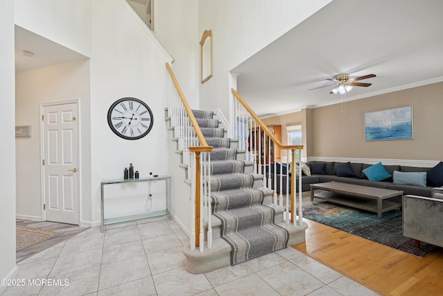 7 Cranberry Ct, Haledon, NJ 07508 - stairway featuring ceiling fan, ornamental molding, and tile patterned flooring