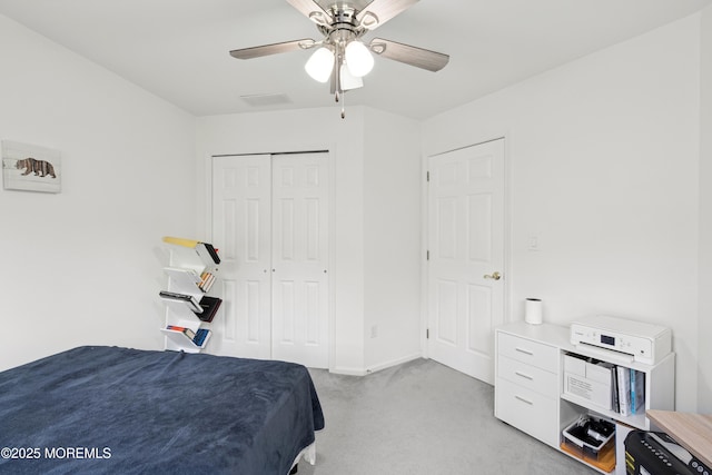 7 Cranberry Ct, Haledon, NJ 07508 - bedroom with light colored carpet, a closet, and a ceiling fan