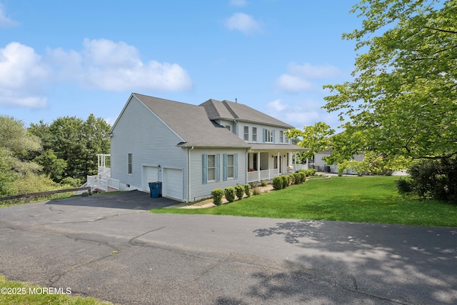7 Cranberry Ct, Haledon, NJ 07508 - view of front of house with driveway, covered porch, a front lawn, and a shingled roof