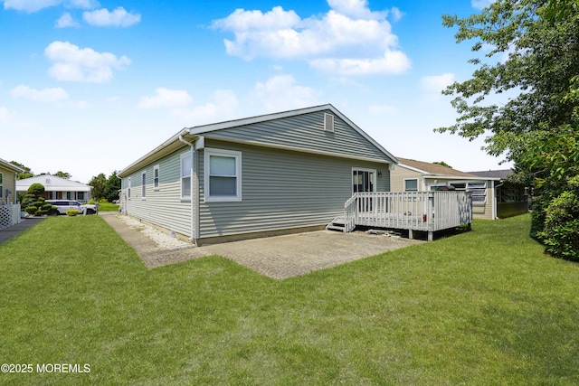 62 Virgin Islands Dr, Toms River, NJ 08757 - rear view of property featuring a wooden deck, a lawn, and a patio area
