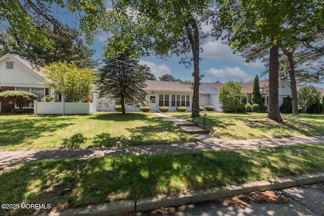 648 Pulham Ct Unit B, Manchester, NJ 08759 - view of front of house featuring an attached garage and a front yard