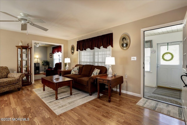 648 Pulham Ct Unit B, Manchester, NJ 08759 - living area featuring light wood-style floors, ceiling fan, and baseboards