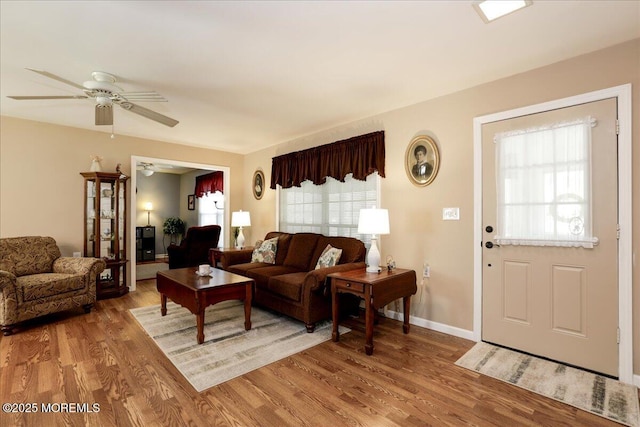 648 Pulham Ct Unit B, Manchester, NJ 08759 - living room with light wood-style flooring, ceiling fan, and baseboards