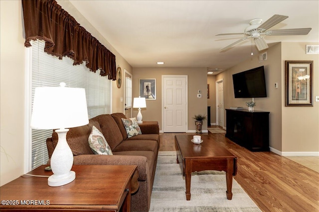 648 Pulham Ct Unit B, Manchester, NJ 08759 - living room with light wood-style floors, baseboards, and a ceiling fan