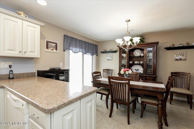 648 Pulham Ct Unit B, Manchester, NJ 08759 - dining room featuring a chandelier and light tile patterned floors