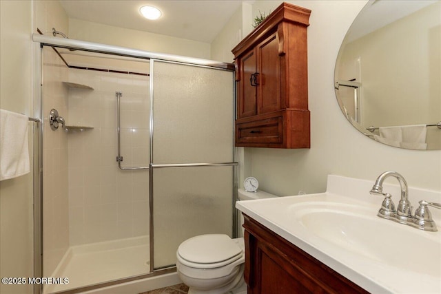 648 Pulham Ct Unit B, Manchester, NJ 08759 - bathroom featuring a stall shower, vanity, and toilet