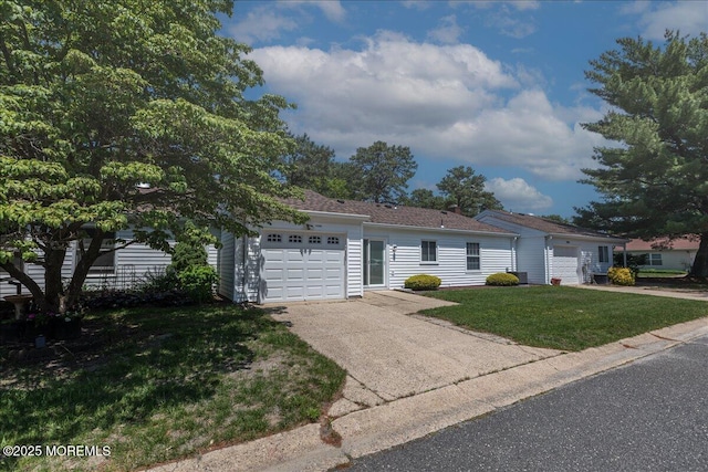 648 Pulham Ct Unit B, Manchester, NJ 08759 - ranch-style house with a garage, concrete driveway, and a front lawn