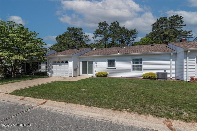 648 Pulham Ct Unit B, Manchester, NJ 08759 - ranch-style house featuring an attached garage, driveway, central AC, and a front yard