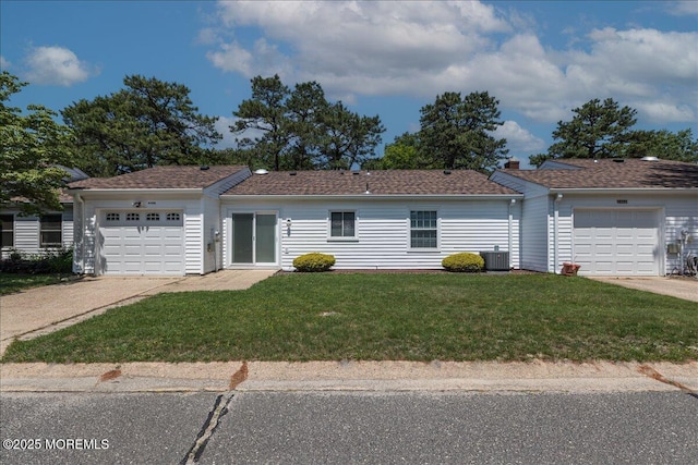648 Pulham Ct Unit B, Manchester, NJ 08759 - ranch-style home featuring an attached garage, driveway, a front lawn, and central AC