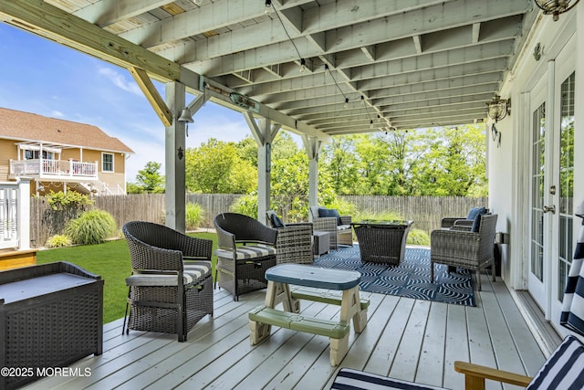 913 Lorillard Ave, Union Beach, NJ 07735 - deck with an outdoor hangout area, a fenced backyard, and french doors