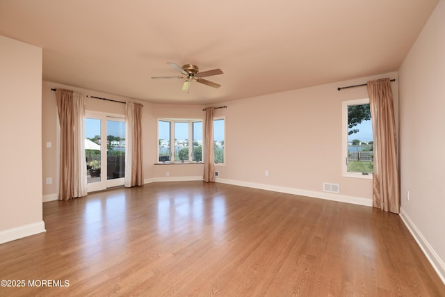 324 Magnolia Ave, Brielle, NJ 08730 - unfurnished room with ceiling fan, healthy amount of natural light, and wood finished floors