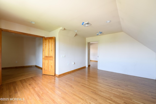 324 Magnolia Ave, Brielle, NJ 08730 - unfurnished room featuring light wood finished floors and lofted ceiling