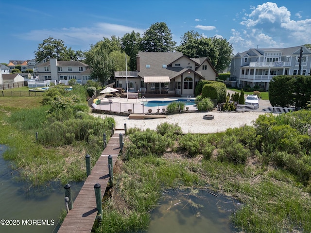 324 Magnolia Ave, Brielle, NJ 08730 - rear view of property featuring an outdoor pool, a patio area, and a residential view