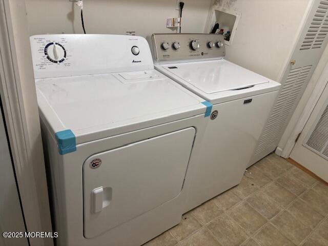 184 Pebble Beach Dr, Mays Landing, NJ 08330 - laundry area with washing machine and clothes dryer