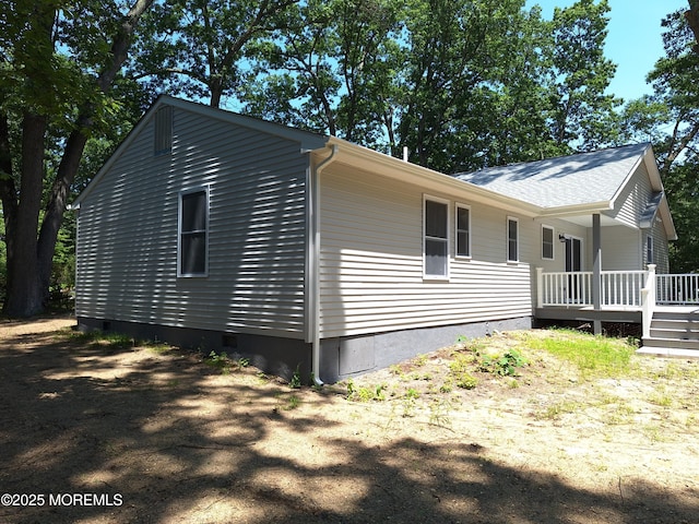 414 Oak Tree Rd, Freehold, NJ 07728 - view of side of property with crawl space and a deck
