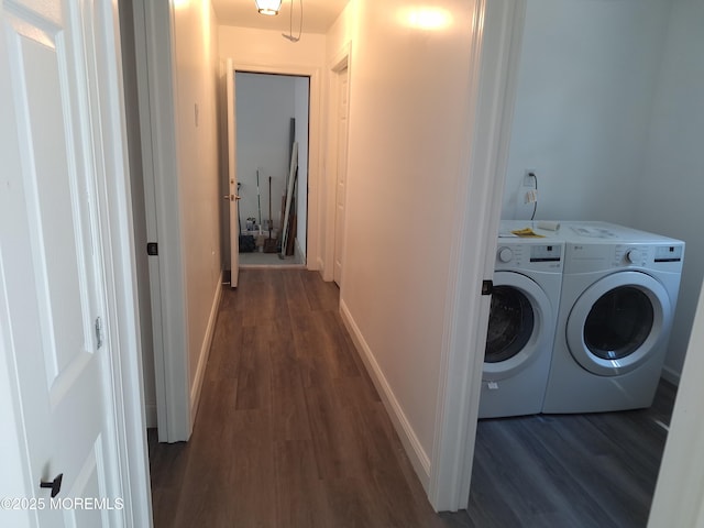 414 Oak Tree Rd, Freehold, NJ 07728 - washroom featuring washing machine and clothes dryer and dark wood-type flooring
