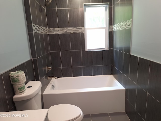 414 Oak Tree Rd, Freehold, NJ 07728 - full bathroom featuring tile walls, shower / bathtub combination, tile patterned flooring, and wainscoting