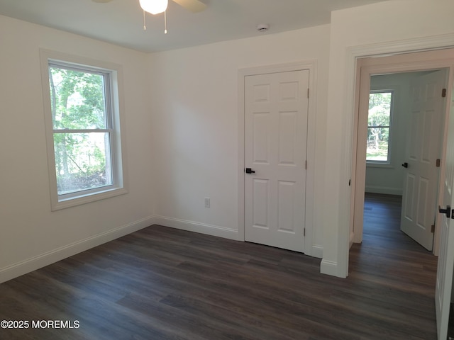 414 Oak Tree Rd, Freehold, NJ 07728 - unfurnished room featuring dark wood-style floors and ceiling fan