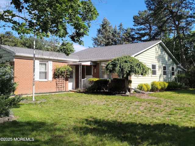 799 Hudson Pkwy, Whiting, NJ 08759 - ranch-style home with brick siding, a front yard, and roof with shingles