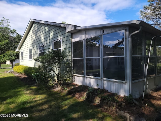 799 Hudson Pkwy, Whiting, NJ 08759 - view of side of home with a sunroom