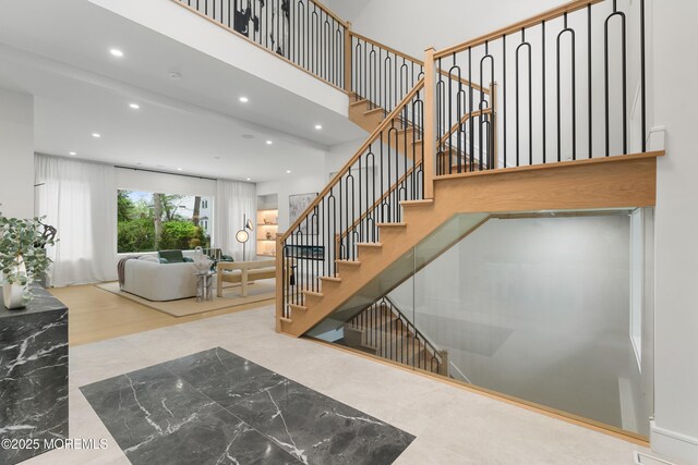 428 Wells Ave, Oakhurst, NJ 07755 - stairway with recessed lighting and a high ceiling