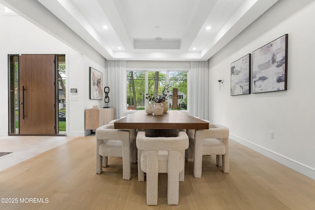 428 Wells Ave, Oakhurst, NJ 07755 - dining space featuring light wood-type flooring, a tray ceiling, recessed lighting, and baseboards