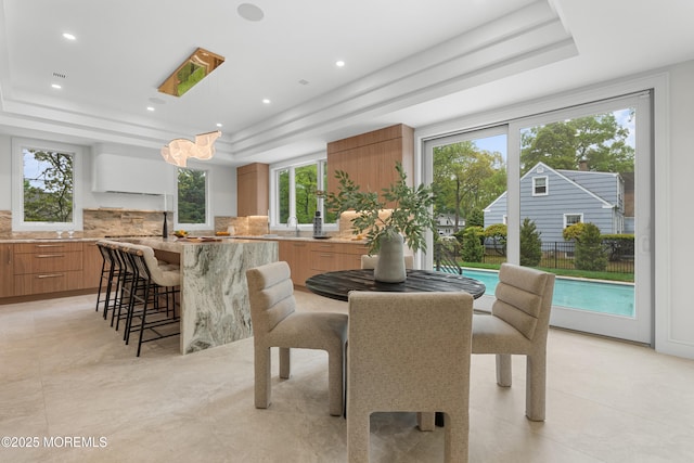 428 Wells Ave, Oakhurst, NJ 07755 - dining room with a raised ceiling, light tile patterned flooring, and recessed lighting