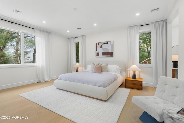 428 Wells Ave, Oakhurst, NJ 07755 - bedroom featuring multiple windows, wood finished floors, recessed lighting, and baseboards