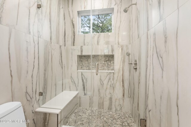 428 Wells Ave, Oakhurst, NJ 07755 - bathroom featuring toilet and a marble finish shower