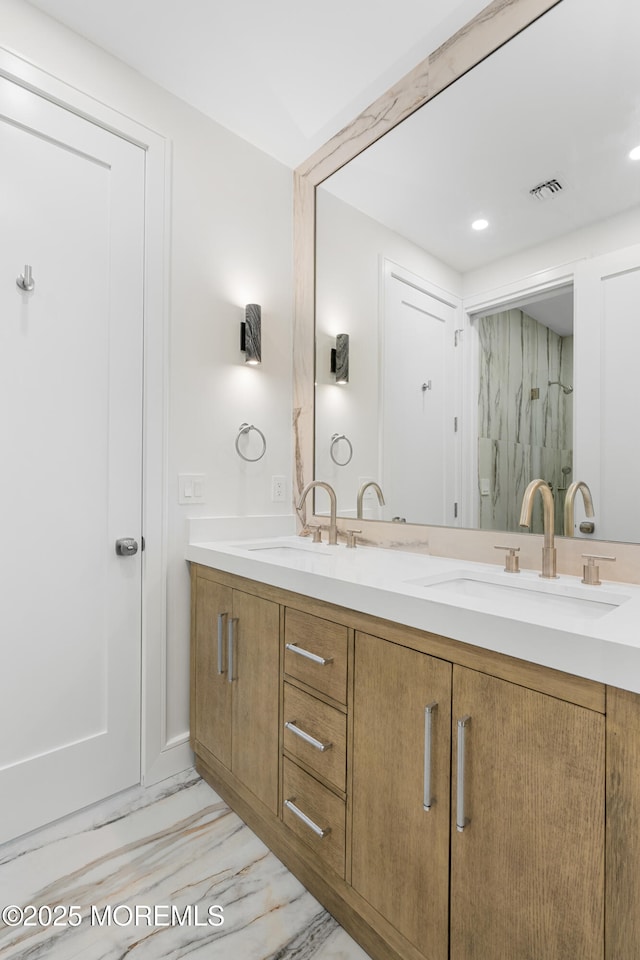 428 Wells Ave, Oakhurst, NJ 07755 - full bath featuring double vanity and a marble finish shower
