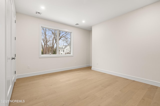 428 Wells Ave, Oakhurst, NJ 07755 - unfurnished room featuring light wood finished floors, baseboards, and recessed lighting