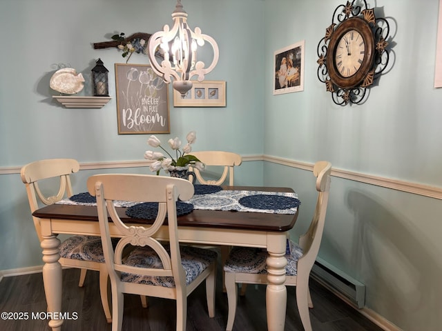 75 Hudson Pkwy Unit C, Whiting, NJ 08759 - dining room featuring a chandelier, baseboard heating, wood finished floors, and baseboards