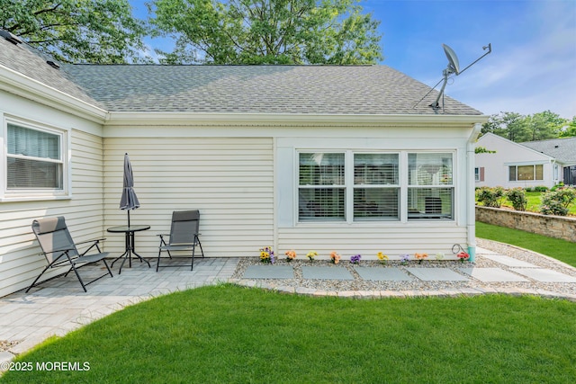 404B Newport Way, Monroe, NJ 08831 - back of house with a patio, roof with shingles, and a lawn