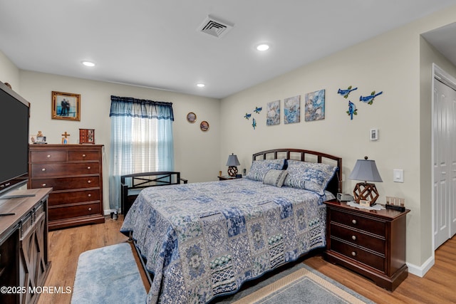 404B Newport Way, Monroe, NJ 08831 - bedroom with light wood finished floors, recessed lighting, and a closet