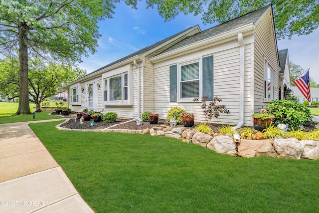 404B Newport Way, Monroe, NJ 08831 - view of front facade with a front lawn and roof with shingles