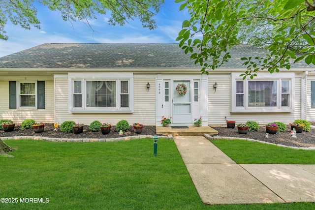 404B Newport Way, Monroe, NJ 08831 - view of front of property with a front yard and a shingled roof