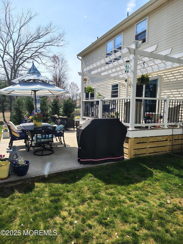 18 Mount Ranier Dr, Howell, NJ 07731 - rear view of property featuring a pergola, a yard, a wooden deck, and a patio area