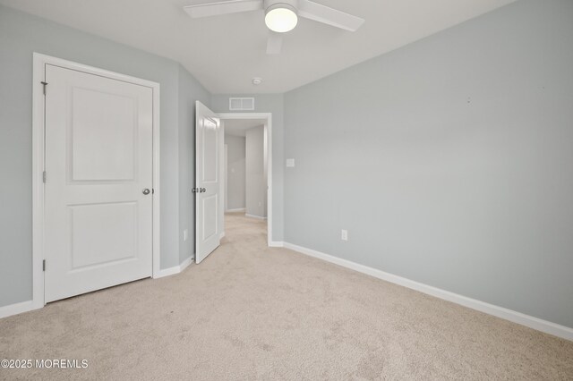 1980 Breakers Dr, Barnegat, NJ 08005 - unfurnished bedroom featuring light carpet, baseboards, and a ceiling fan