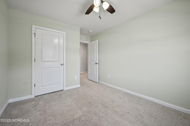 1980 Breakers Dr, Barnegat, NJ 08005 - unfurnished bedroom featuring carpet, baseboards, and ceiling fan