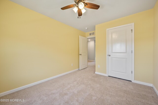1980 Breakers Dr, Barnegat, NJ 08005 - unfurnished bedroom featuring light carpet, baseboards, and a ceiling fan