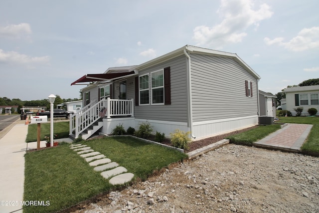 610 Jerome Pl, Freehold, NJ 07728 - view of front facade with a front yard