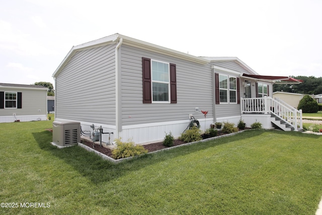 610 Jerome Pl, Freehold, NJ 07728 - view of property exterior with a lawn