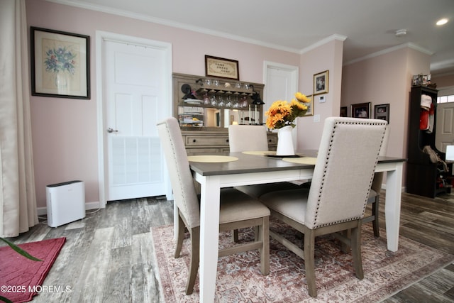 610 Jerome Pl, Freehold, NJ 07728 - dining space featuring wood finished floors, ornamental molding, and recessed lighting