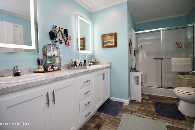 610 Jerome Pl, Freehold, NJ 07728 - full bath with crown molding, a shower stall, wood finished floors, and double vanity