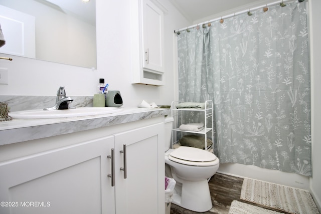 610 Jerome Pl, Freehold, NJ 07728 - full bath featuring wood finished floors, vanity, and shower / bath combo