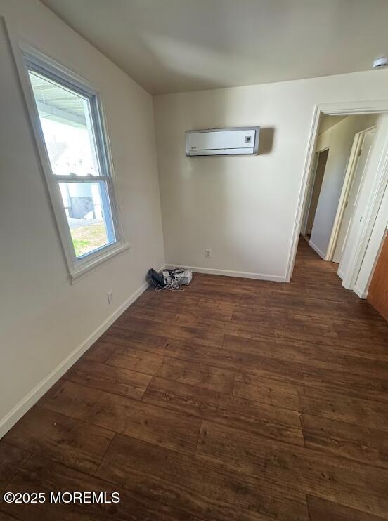 3 Oceanview Ave, Keansburg, NJ 07734 - spare room featuring a wall mounted AC, wood finished floors, and baseboards