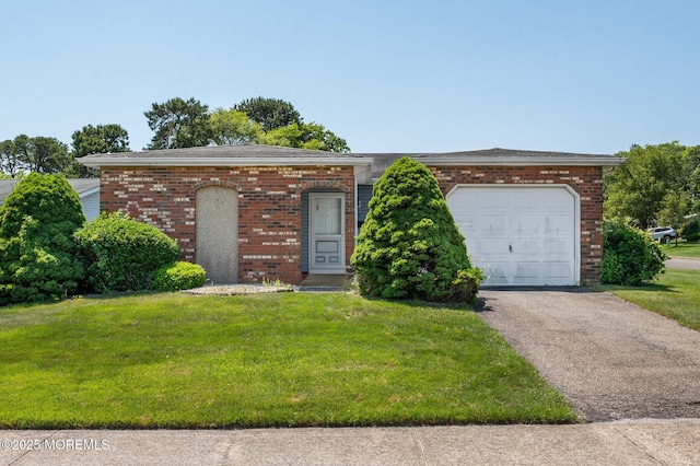 19 Clay Cir, Brick, NJ 08724 - ranch-style house featuring brick siding, a front lawn, and an attached garage