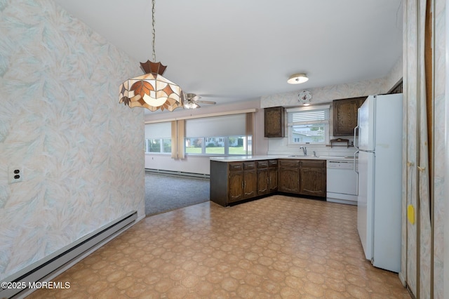 19 Clay Cir, Brick, NJ 08724 - kitchen with white appliances, a baseboard radiator, a sink, and dark brown cabinets
